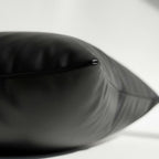 Black vegan leather pillow cover showing concealed hidden zipper closure detail