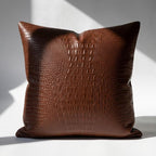 Single brown vegan leather crocodile embossed pillow cover – front view