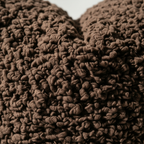 Close-up of boucle curly-loop texture on premium sherpa pillow cover in brown – Larissa Home Decor