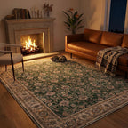Green vintage floral area rug in cozy living room with fireplace and leather sofa