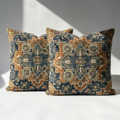 Set of 2 Persian chenille throw pillow covers with navy blue and rust medallion pattern on white surface