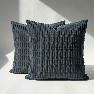 Set of 2 wide wale corduroy throw pillow covers in navy blue with chunky ribbed texture, shown on white surface