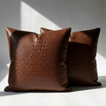 Set of 2 vegan leather crocodile embossed throw pillow covers in brown – 18x18