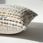 Side view of boho chenille tufted pillow cover showing hidden zipper and solid cotton canvas back panel