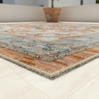 Corner detail of Persian vintage rug showing serged edge binding and non-slip flat-woven construction