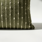 Side corner detail of jacquard woven boucle pillow cover showing dimensional stripe texture and fabric depth