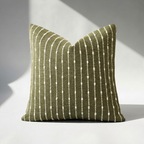 Single jacquard boucle pillow cover with textured vertical stripe design in olive green, front view
