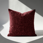 Single burgundy chenille pillow cover showing rich jewel-tone color and soft textured fabric
