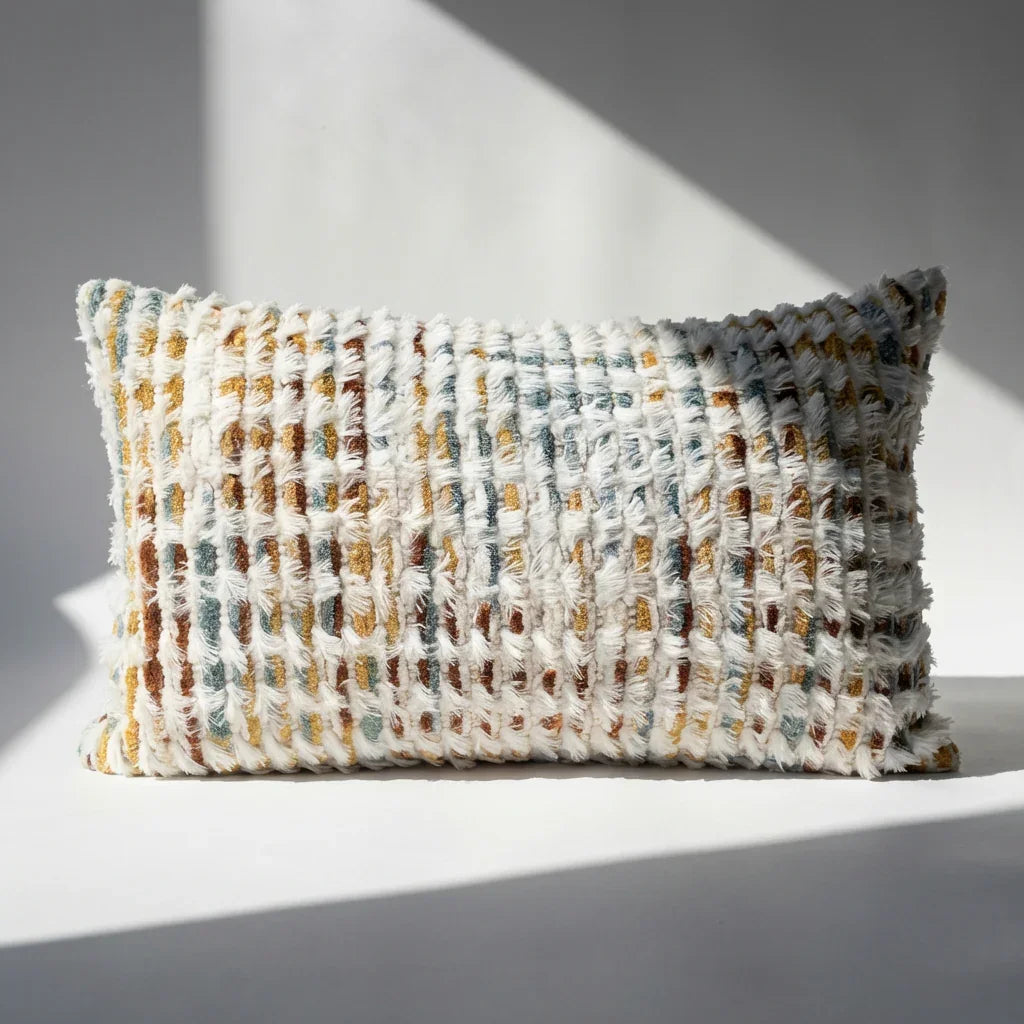 Chenille tufted lumbar throw pillow cover in cream multicolor boho palette displayed on white surface